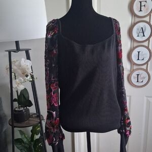Chic Black Top with Floral Sleeves